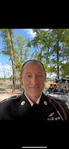 38-year-old Nicholas Sammartino in full military dress uniform standing proudly