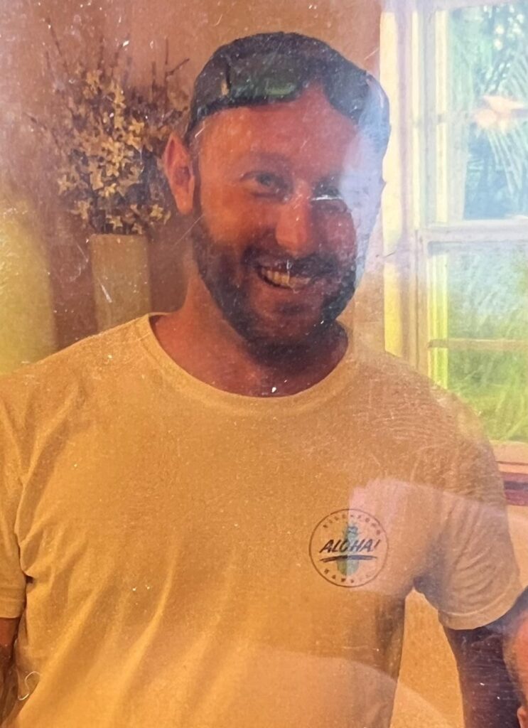 Nicholas Sammartino smiling outside his home in Chatham County, Georgia.